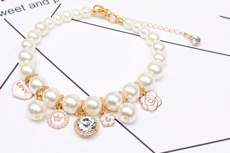 Designer Necklace with Pearls Charms and Blings